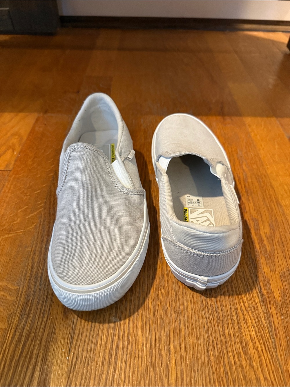 Vans Women’s Slip-On Sneakers in Light Gray Canvas